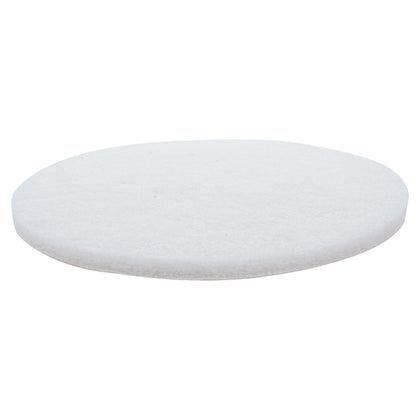 Side view of a white non-woven finishing pad showing its thickness